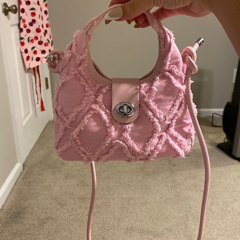 Distressed pink crossbody bag